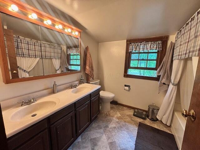 91 Bridle Path Ln, Granville, OH 43023 - full bathroom featuring double vanity, toilet, baseboards, and shower / bathtub combination with curtain