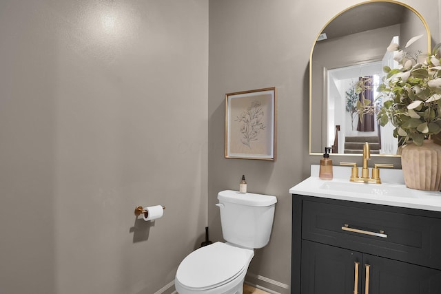 417 Bren Dr, Lancaster, OH 43130 - half bath featuring toilet, vanity, and baseboards