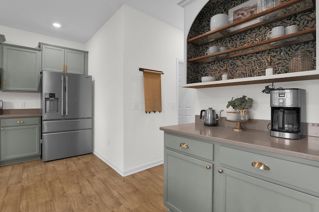 417 Bren Dr, Lancaster, OH 43130 - kitchen with stainless steel refrigerator with ice dispenser, open shelves, light wood-style floors, and baseboards