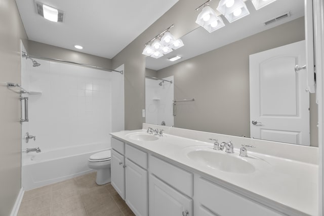 6655 Baronscourt Loop, Dublin, OH 43016 - bathroom featuring toilet, double vanity, shower / bathtub combination, and tile patterned floors