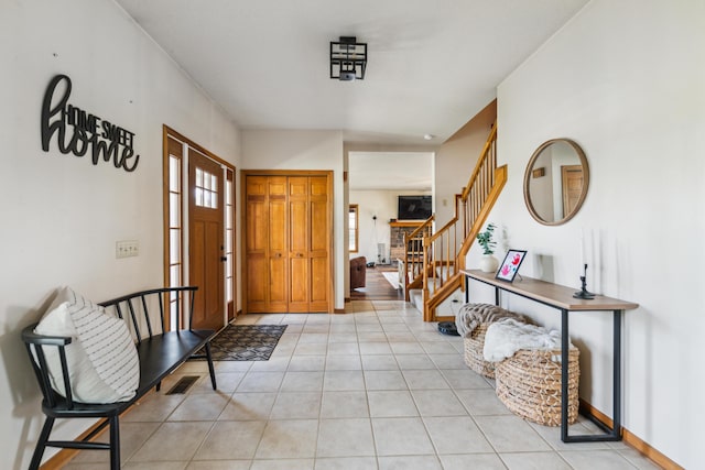 17994 Claypool Rd SE, Newark, OH 43056 - entrance foyer featuring stairs and light tile patterned floors