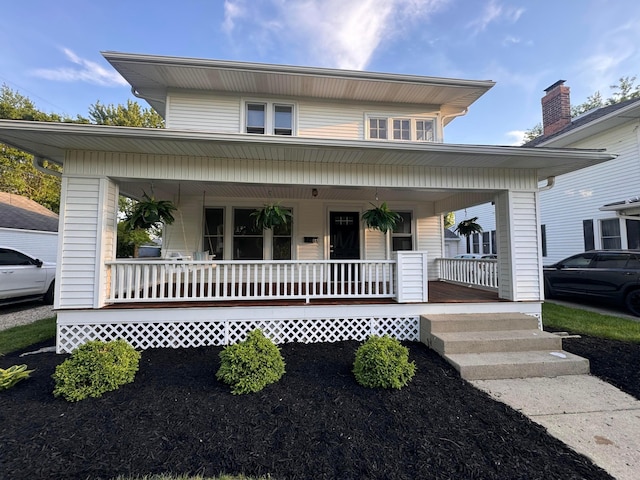 84 E 5th St, London, OH 43140 - view of front of home featuring covered porch