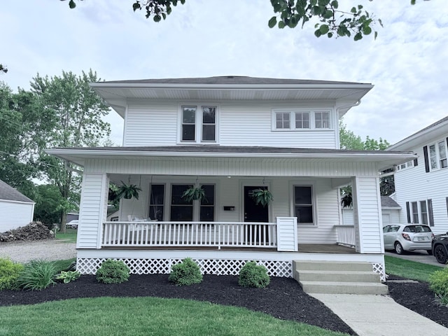 84 E 5th St, London, OH 43140 - view of front of home featuring a porch