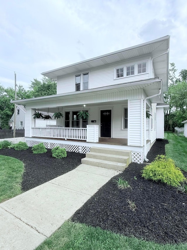 84 E 5th St, London, OH 43140 - view of front facade featuring covered porch