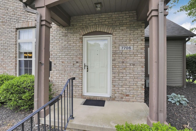 7706 Redman Ln, Reynoldsburg, OH 43068 - doorway to property featuring brick siding