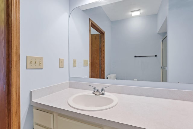 7706 Redman Ln, Reynoldsburg, OH 43068 - full bath featuring vanity and a shower with shower door