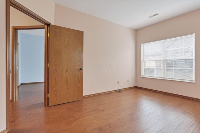 7706 Redman Ln, Reynoldsburg, OH 43068 - spare room featuring light wood-type flooring and baseboards