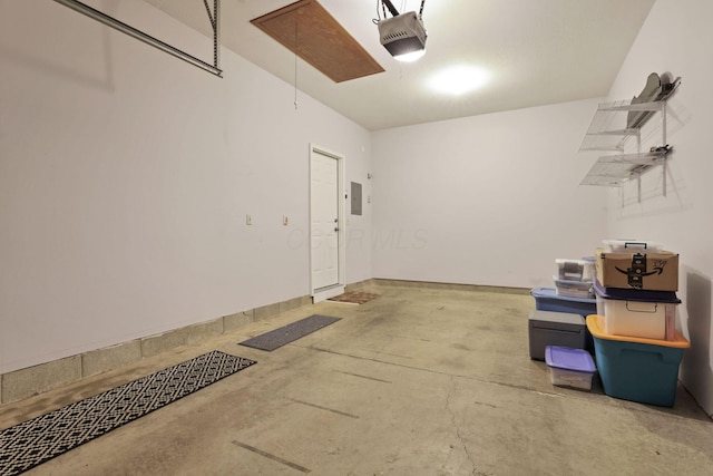 7706 Redman Ln, Reynoldsburg, OH 43068 - garage featuring a garage door opener and electric panel