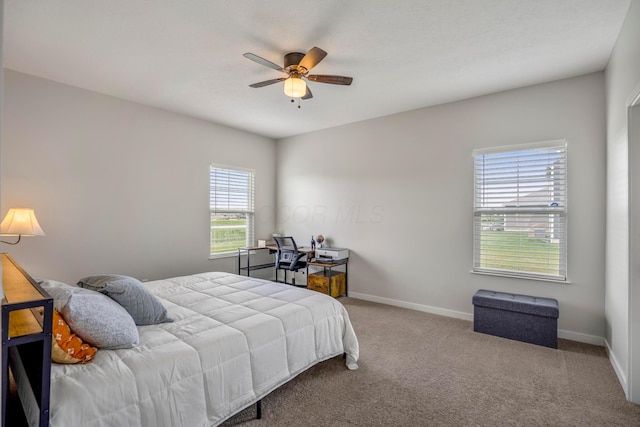 1002 Leslie Dr, Plain City, OH 43064 - bedroom with carpet, baseboards, and ceiling fan