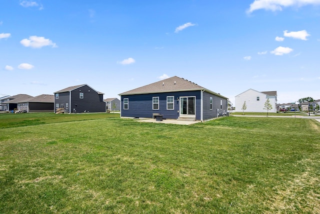 1002 Leslie Dr, Plain City, OH 43064 - rear view of house with a yard and a patio