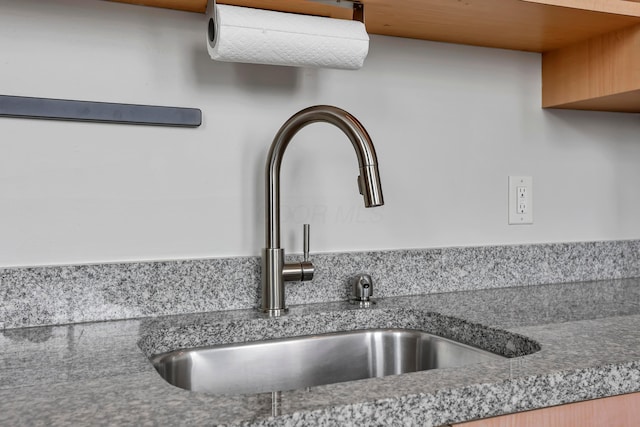60 E Spring St Unit 327, Columbus, OH 43215 - kitchen view of a sink and stone counters