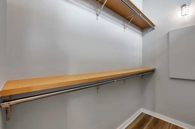 60 E Spring St Unit 327, Columbus, OH 43215 - walk in closet featuring dark wood-type flooring