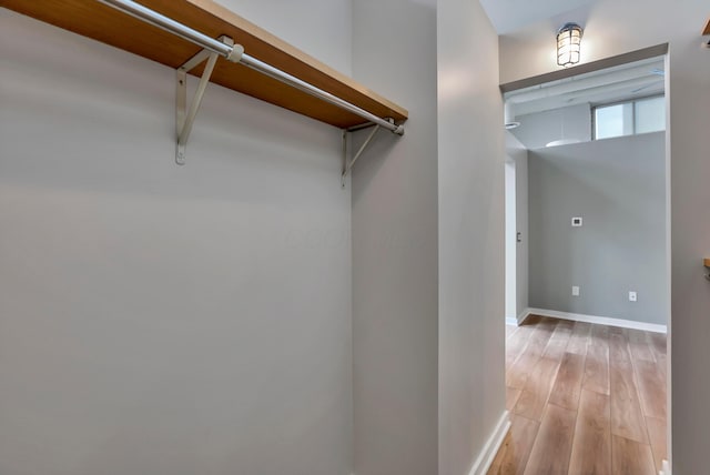 60 E Spring St Unit 327, Columbus, OH 43215 - walk in closet with light wood finished floors
