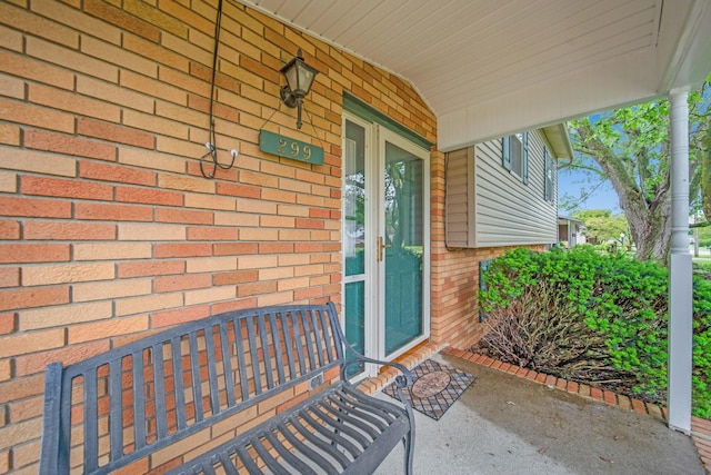 299 Sherwood Downs S, Newark, OH 43055 - property entrance with brick siding and a porch