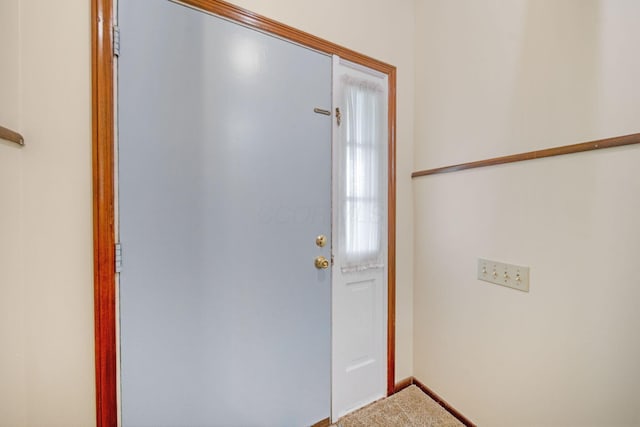 299 Sherwood Downs S, Newark, OH 43055 - doorway featuring baseboards and carpet