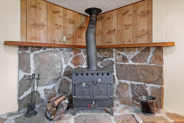299 Sherwood Downs S, Newark, OH 43055 - detailed view of a wood stove and a textured ceiling