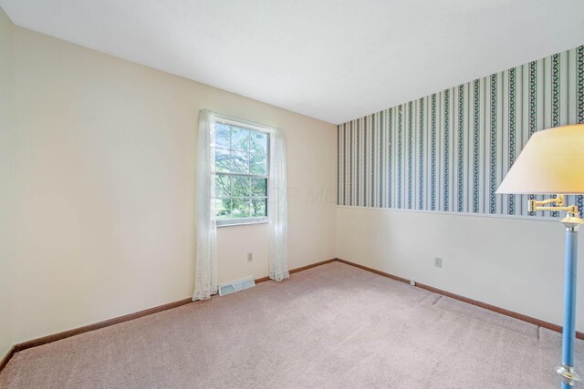 299 Sherwood Downs S, Newark, OH 43055 - empty room featuring carpet floors and baseboards