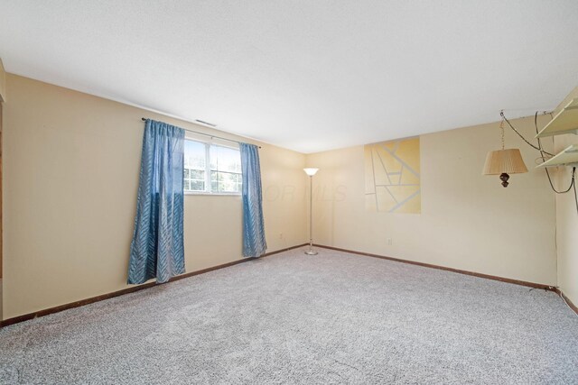 299 Sherwood Downs S, Newark, OH 43055 - spare room with carpet flooring and baseboards