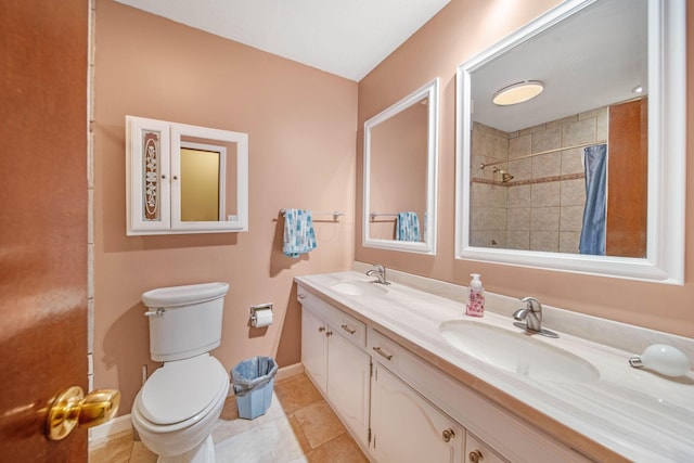 299 Sherwood Downs S, Newark, OH 43055 - bathroom featuring toilet, double vanity, baseboards, a tile shower, and tile patterned floors