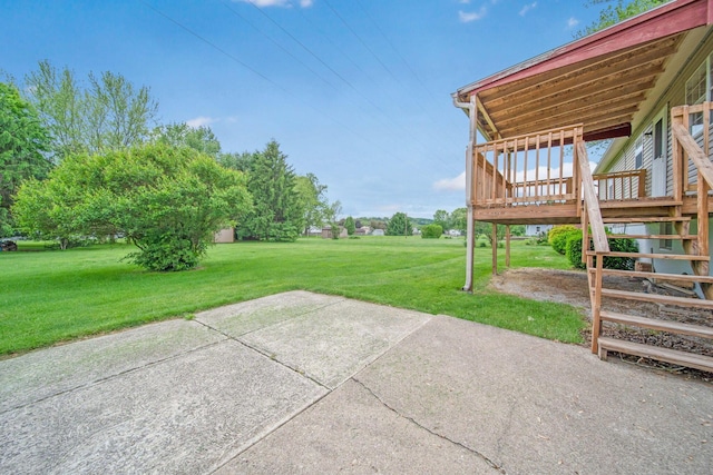 299 Sherwood Downs S, Newark, OH 43055 - view of green lawn featuring a patio, a wooden deck, and stairs