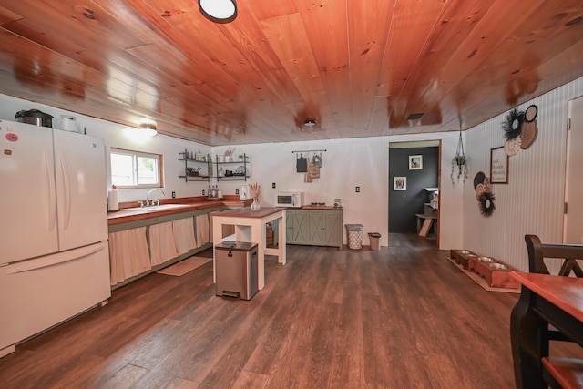 6566 S St, Marion, OH 43302 - kitchen featuring white appliances, wooden ceiling, dark wood-type flooring, and a sink