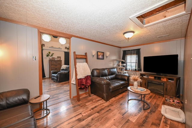 6566 S St, Marion, OH 43302 - living area featuring crown molding, wood finished floors, and an ornate ceiling