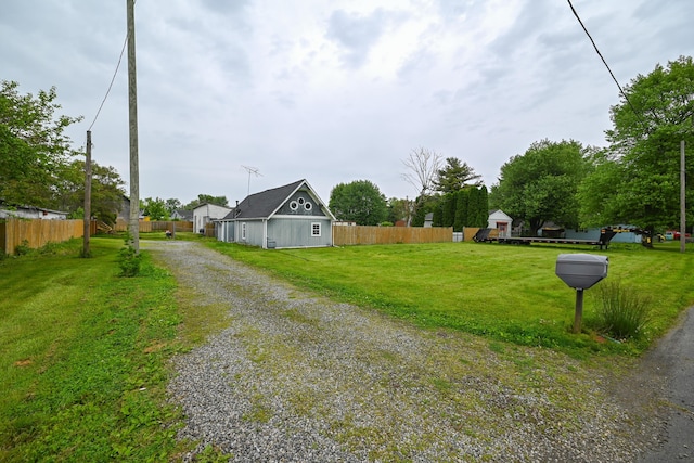 6566 S St, Marion, OH 43302 - view of dirt / gravel driveway with a barn