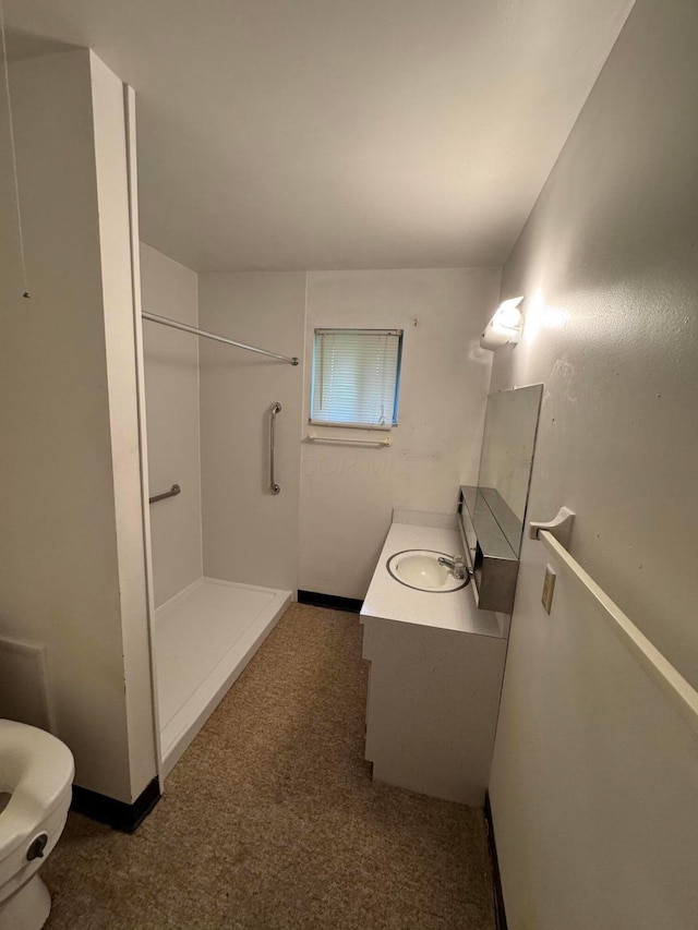 2348 Woodbrook Cir N Unit 86, Columbus, OH 43223 - full bath with vanity, a walk in shower, and toilet