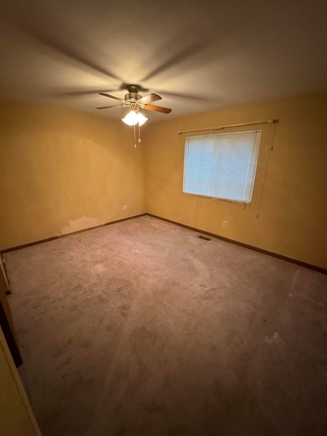 2348 Woodbrook Cir N Unit 86, Columbus, OH 43223 - unfurnished room with a ceiling fan, baseboards, and carpet