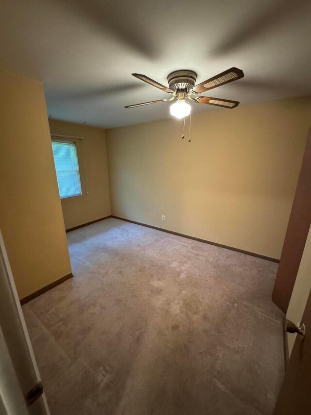 2348 Woodbrook Cir N Unit 86, Columbus, OH 43223 - unfurnished room with ceiling fan, carpet flooring, and baseboards