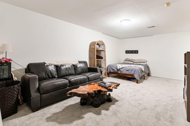 797 S Front St, Columbus, OH 43206 - carpeted bedroom featuring a textured ceiling and baseboards
