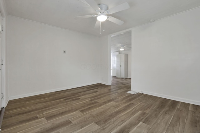 663 E Mound St, Circleville, OH 43113 - spare room with ceiling fan, wood finished floors, and baseboards