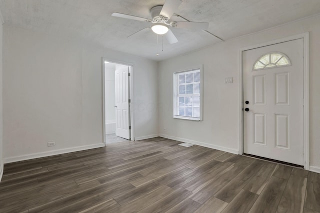 663 E Mound St, Circleville, OH 43113 - foyer with ceiling fan, dark wood finished floors, and baseboards