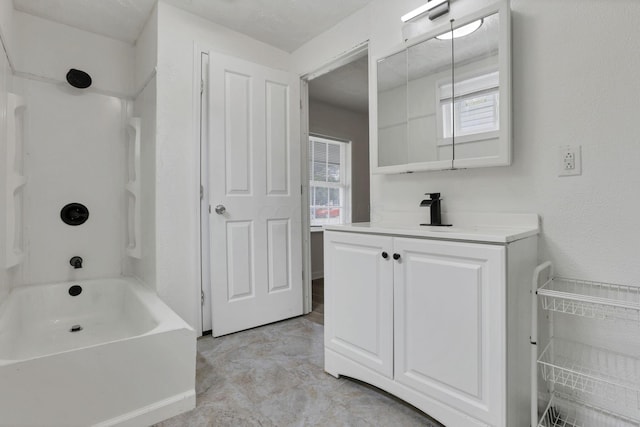 663 E Mound St, Circleville, OH 43113 - bathroom featuring plenty of natural light, vanity, and  shower combination