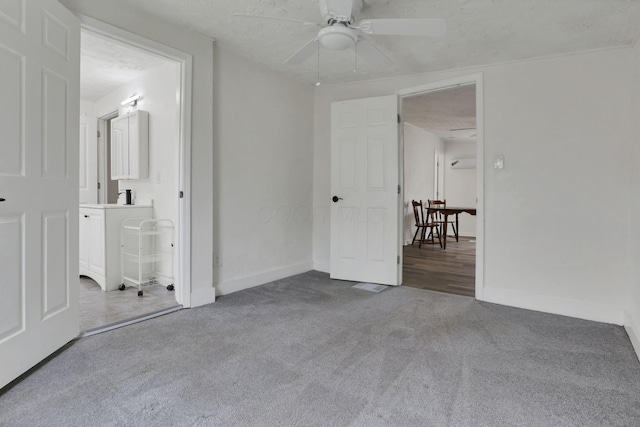 663 E Mound St, Circleville, OH 43113 - unfurnished bedroom with carpet, baseboards, and ceiling fan