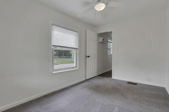 663 E Mound St, Circleville, OH 43113 - empty room featuring carpet, plenty of natural light, and baseboards