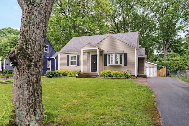 542 Blenheim Rd, Columbus, OH 43214 - view of front of home with a gate, a shingled roof, a chimney, and a garage