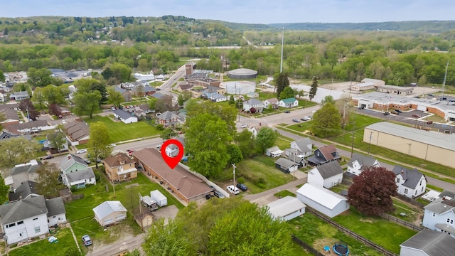 320 N 3rd St, Coshocton, OH 43812 - view of property location featuring nearby suburban area and a forest