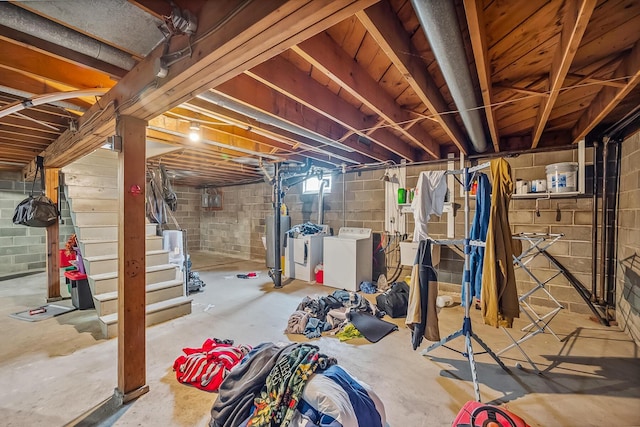 320 N 3rd St, Coshocton, OH 43812 - basement featuring washing machine and clothes dryer, stairs, and water heater