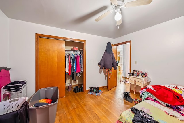 320 N 3rd St, Coshocton, OH 43812 - bedroom with light wood-type flooring, ceiling fan, and a closet