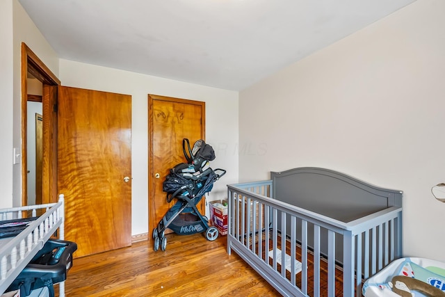 320 N 3rd St, Coshocton, OH 43812 - bedroom featuring wood finished floors