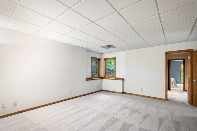 255 Partridge Bnd, Powell, OH 43065 - empty room with light carpet, a paneled ceiling, and baseboards