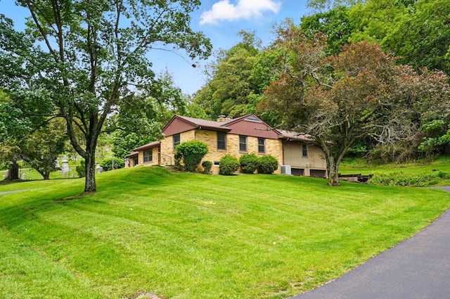 1244 N Broad St, Lancaster, OH 43130 - view of front of property with an attached garage, a front lawn, and a chimney