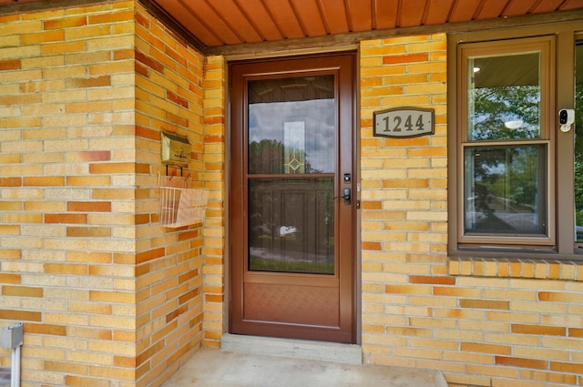 1244 N Broad St, Lancaster, OH 43130 - doorway to property with brick siding
