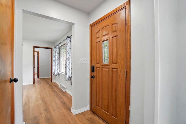 1244 N Broad St, Lancaster, OH 43130 - foyer entrance with light wood-style flooring and baseboards