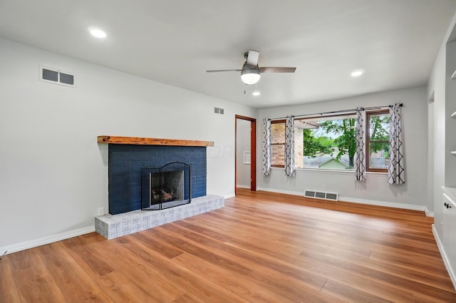 1244 N Broad St, Lancaster, OH 43130 - unfurnished living room with ceiling fan, wood finished floors, baseboards, a fireplace, and recessed lighting