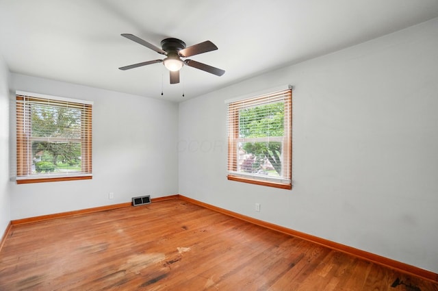 1244 N Broad St, Lancaster, OH 43130 - empty room featuring plenty of natural light, light wood-style floors, baseboards, and ceiling fan