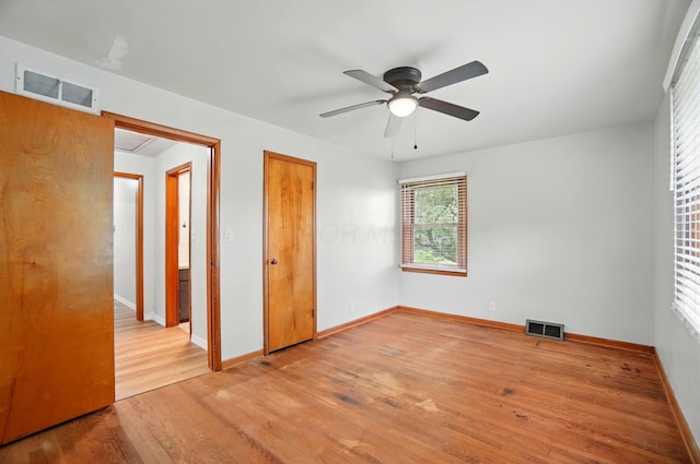 1244 N Broad St, Lancaster, OH 43130 - unfurnished bedroom featuring wood finished floors, baseboards, and a ceiling fan