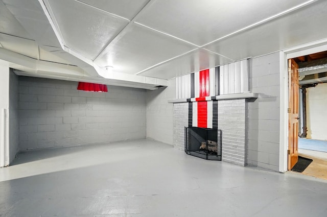 1244 N Broad St, Lancaster, OH 43130 - finished basement featuring a fireplace and concrete block wall