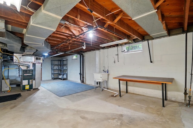 1244 N Broad St, Lancaster, OH 43130 - basement featuring heating unit and a sink